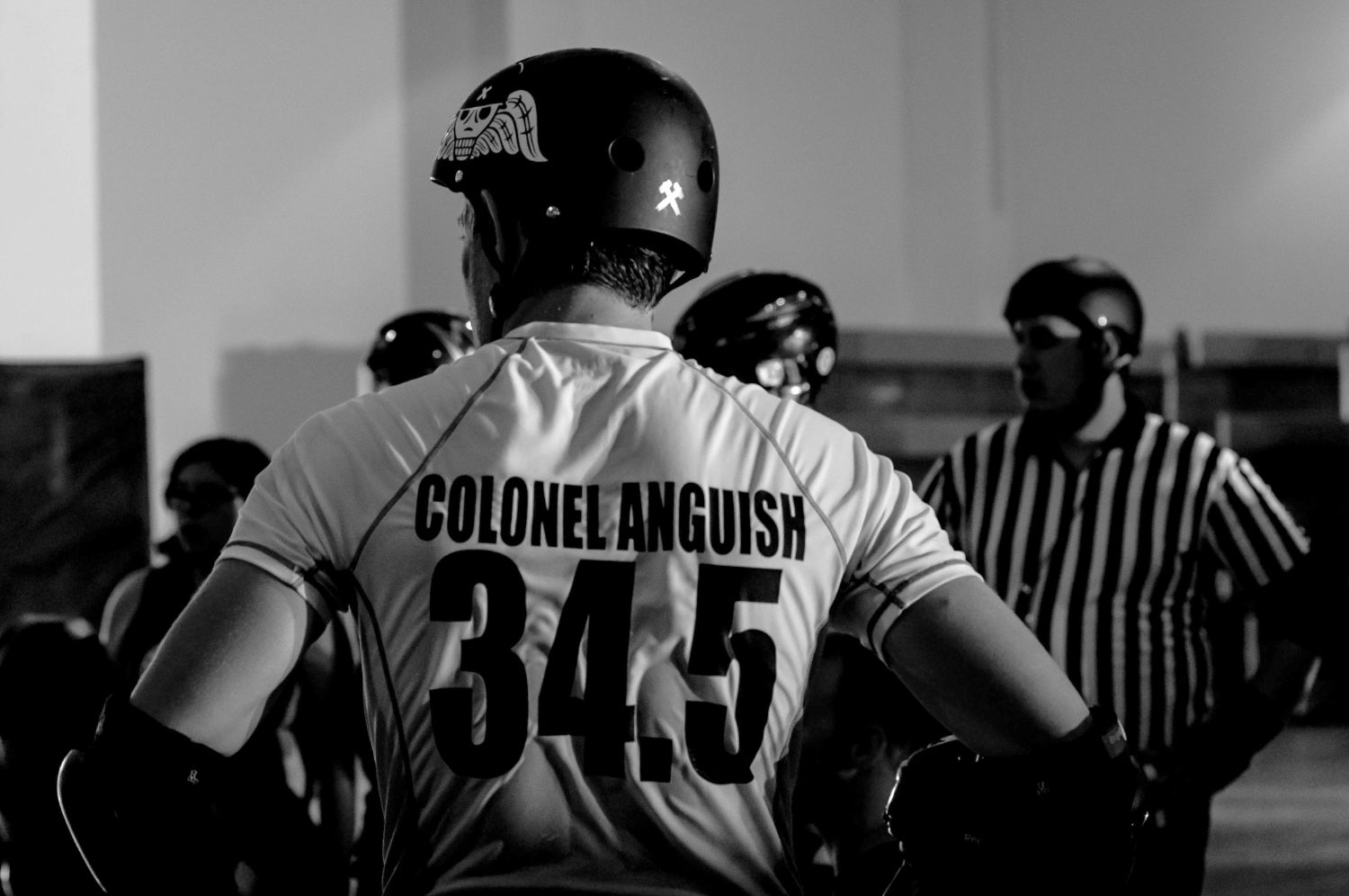 Martin seen from behind in his roller derby gear